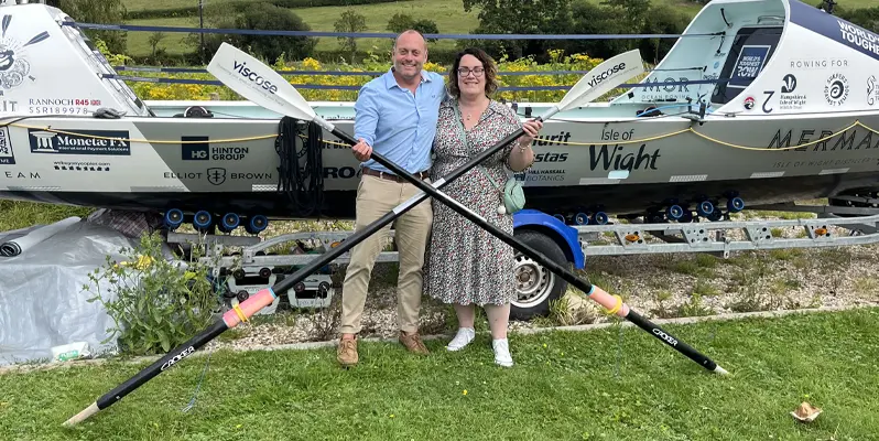 Xavier Baker and Emma Blackmore holding Viscose sponsored oars